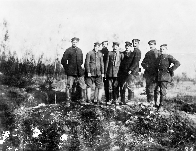 Adolf Hitler (4th from right) and his comrades in the fields near Fromelles, France
